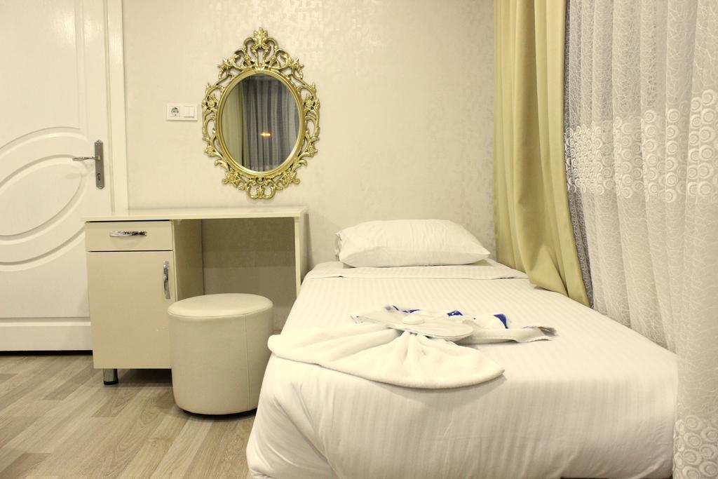 Simge Hotel Истанбул Стая снимка